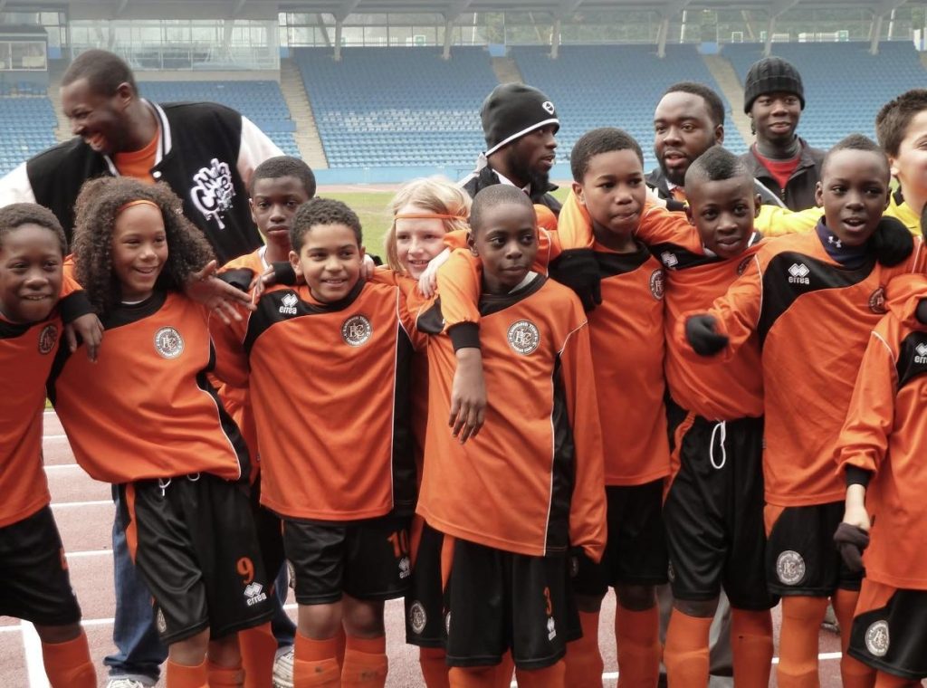 Young TSF players in action on the pitch in Brixton